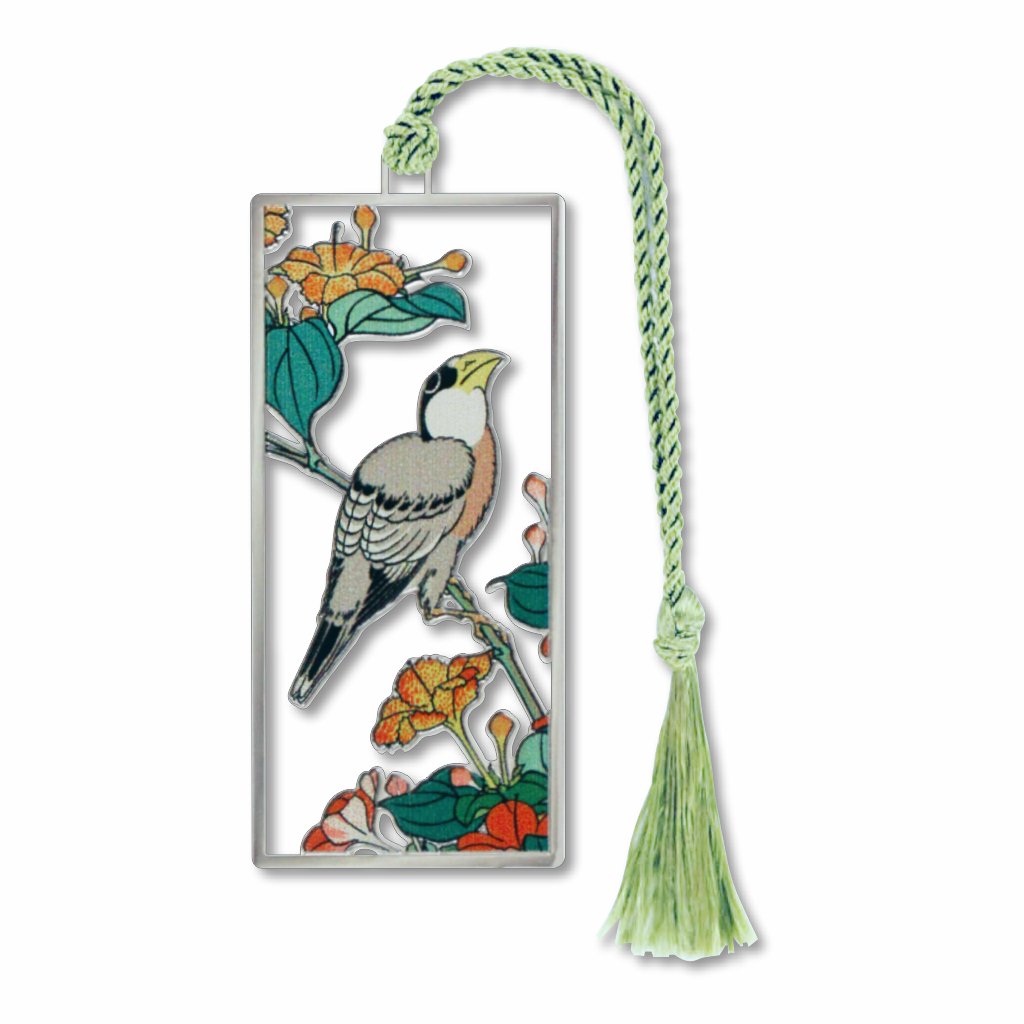 A silver metal bookmark with a bird perched on top of a flower branch attached to a green braided tassel.