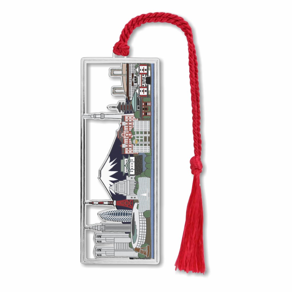 Silver metal bookmark of the Tokyo skyline with red braided tassel.