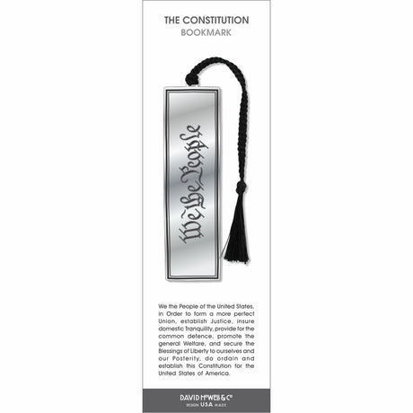 The Constitution’ bookmark featuring engraved script on a silver-toned design with a black braided tassel.