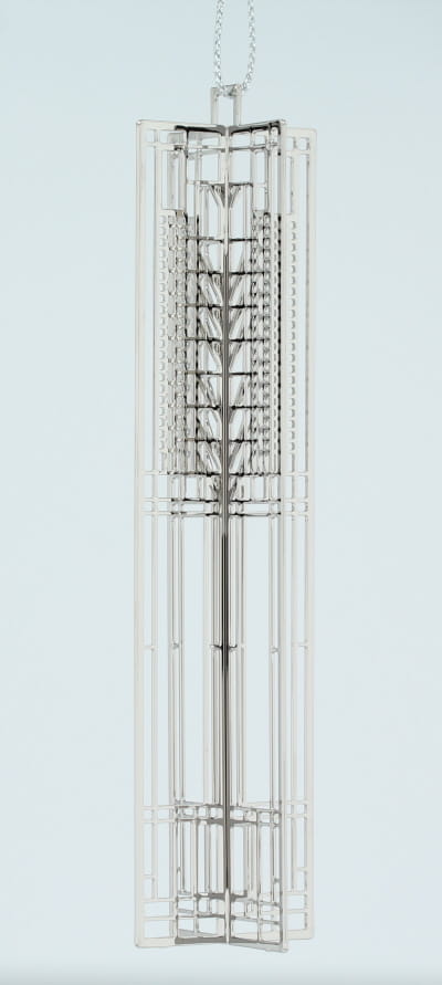 Frank Lloyd Wright Tree of Life silver metal keepsake based on a window design.