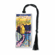 A silver metal bookmark featuring an abstract painting with geometric forms in blue, yellow, and pink, with a house and trees, completed with a black tassel.
