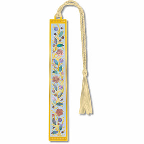 Noble Ware metal bookmark inspired by a historical dessert knife handle used by Louis XVI. The design reflects a solid gold handle inlaid with mother-of-pearl, showcasing intricate craftsmanship and the opulent style of royal tableware associated with 18th-century French luxury and conspicuous consumption wit cream braided tassel.