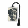A silver metal bookmark featuring a black and white print of Rembrandt's self-portrait, with a silver finish and a black tassel.