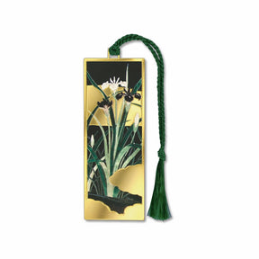 A metal bookmark with a gold finish featuring a floral design with gold accents, green leaves and floral buds attached to a green braided tassel.