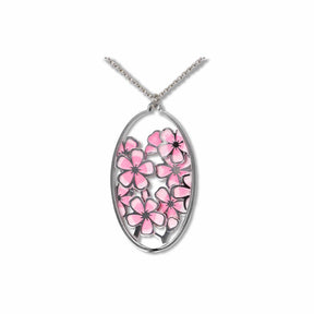 Hiroshige Cherry Blossom pendant necklace featuring an oval silver-tone pendant filled with pink cherry blossom flowers and delicate openwork branch detailing on a silver chain.